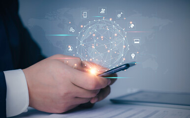 Businessman hand working with smart phone in office with virtual icon diagram.Businessman using mobile smart phone. Business global internet connection application technology and digital marketing.