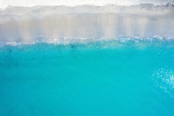 Beautiful turquoise sea and wave on the beach in sunny day