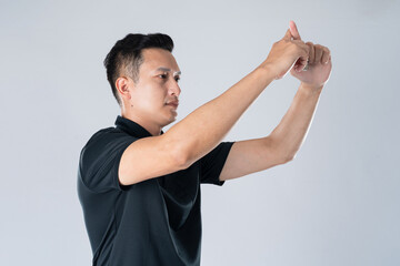 Football referee showing VAR symbol.