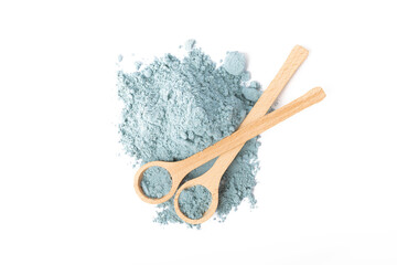 Blue spirulina powder in spoon isolated on white background. Natural vegan superfood. food...