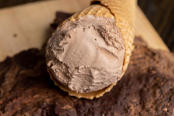 Chocolate ice cream in a waffle cup
