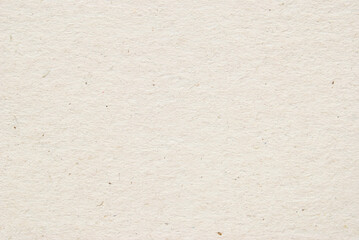A sheet of beige recycled cardboard texture as background
