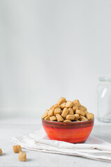 Nigerian Chin chin in an enamel bowl, Fried chin-chin snack in an enamel bowl, Nigerian party food and small chops