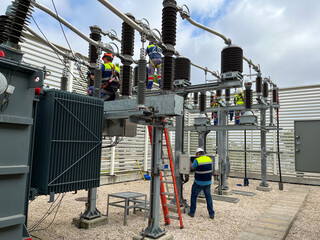 Maintenance in a high voltage electrical substation - obrazy, fototapety, plakaty