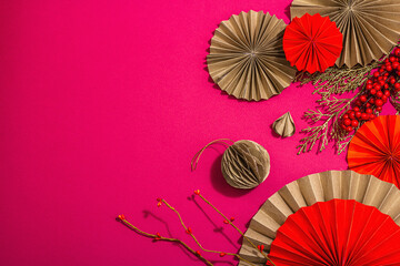 Lunar Chinese New Year concept. Oriental asian style paper fans, traditional decor, minimal concept