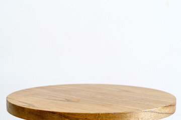 Round wooden table isolate on empty background. Wooden table surface