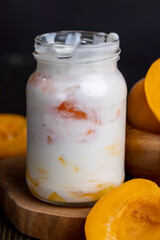 yogurt with fresh berries and apricot jam