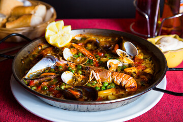 Traditional Spanish paella with red prawns from Ibiza. Typical recipe with seafood from the famous Spanish tapa.