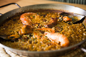 Traditional Spanish paella with red prawns from Ibiza. Typical recipe with seafood from the famous Spanish tapa.