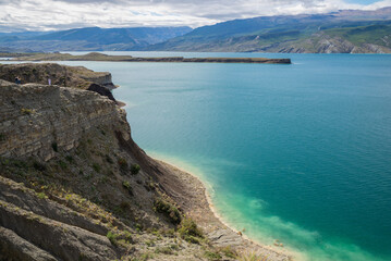 Fototapeta na wymiar View of the Sulak reservoir on a sunny day. Republic of Dagestan, Russia