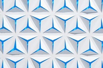 White-blue abstract paper background with triangles.