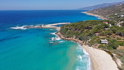 Aerial drone photo of famous wavy beach of Mesakti ideal for wind surfing in island of Ikaria, Aegean, Greece