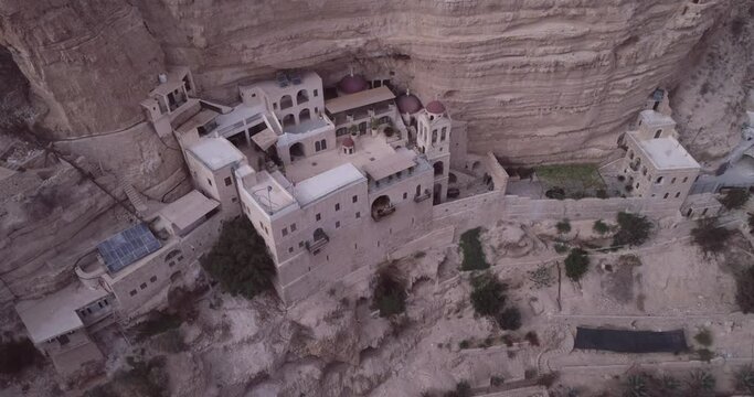 St. George Orthodox Monastery and Wadi Qelt in Judean desert. Monastery of St. George of Choziba, Israel. The sixth-century cliff-hanging complex