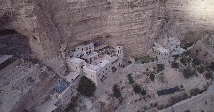 St. George Orthodox Monastery and Wadi Qelt in Judean desert. Monastery of St. George of Choziba, Israel. The sixth-century cliff-hanging complex