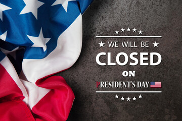 Obraz na płótnie Canvas President's Day Background Design. American flag on rusty iron background with a message. We will be Closed on President's Day.