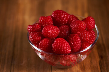 Raspberries on a wooden board