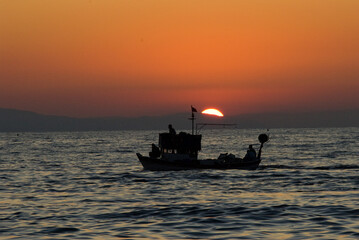 fisherman at sunset