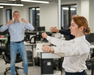 Obraz premium Three office workers warm up during a break. Employees do fitness exercises at the workplace. 