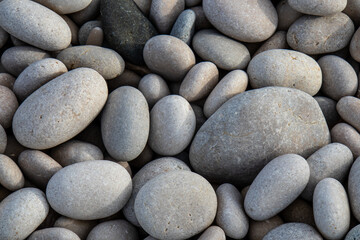 Fototapeta na wymiar Stones on the beach of Alfaz del Pi, Costa Blanca, Spain