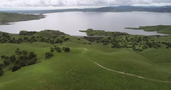 San Luis Reservoir in Background and Upper Cottonwood Creek Wildlife Area near Los Banos. California. USA. Mountains in Background