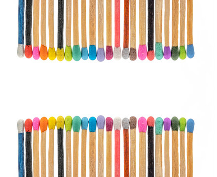 matchsticks various colors on white background