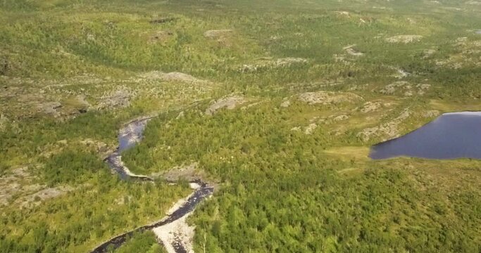 Aerial view of Galggojohka river on the E8 Nordlysveien road in summer when it&acute;s dried up, Storfjord, Troms og Finnmark, Norway. 