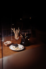 A beautiful cheese and savory fondue table. With a glass of wine. Elegant foo for restaurants.