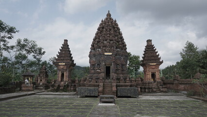 Fototapeta premium The landscape looks in front of the temple with Javanese architecture. Hindu religious temple.