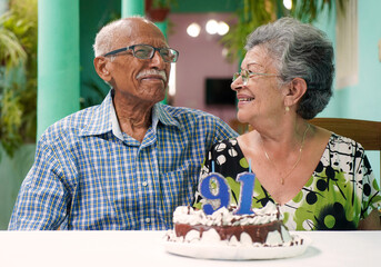 Elder couple celebrating man's 91 st birthday
