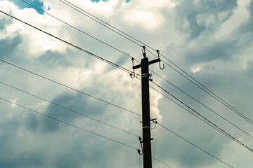 Power electric pole with line wire on colored background close up