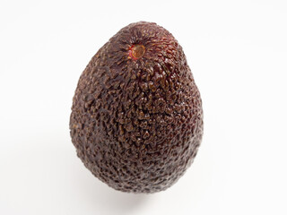 Ripe avocado on a white background. Fresh avocado.