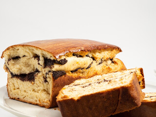 Freshly baked bread with poppy seeds.