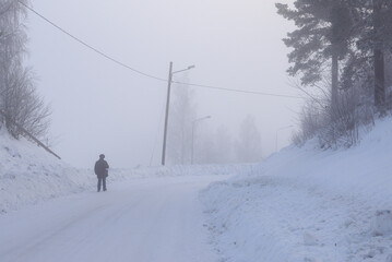 Downhill winter walk
