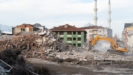 Urban transformation, the process of redevelopment and revitalization of urban areas. Excavators in...