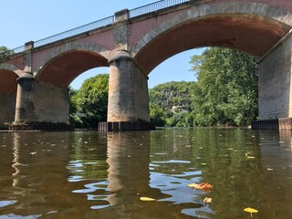 Fototapeta na wymiar France old stone bridge over river