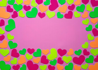 Composition for Valentine's Day, February 14th, Puppy love with copy space. Top view. Paper heart decor. Delicate pink background and hearts cut out of paper. Space for text. Valentine frame. Flat lay