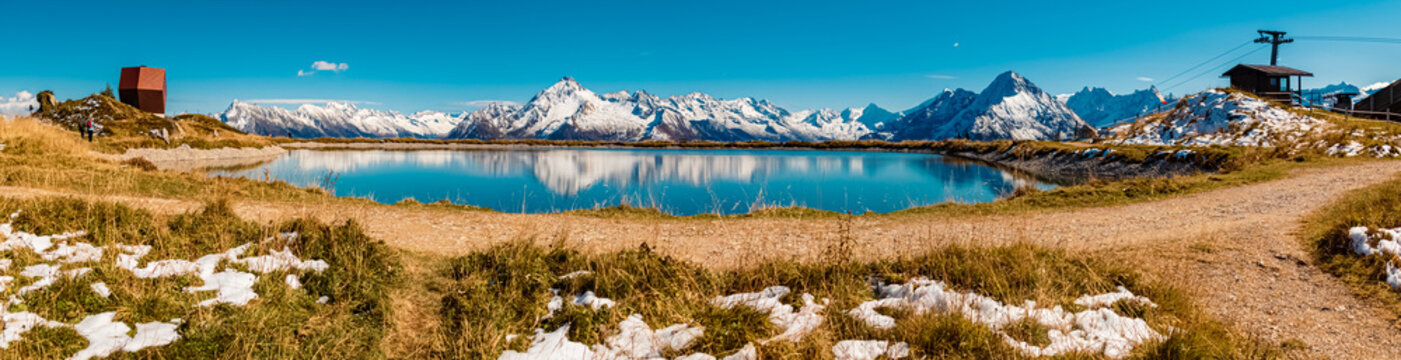 High resolution panorama with the famous Capella Granata and reflections in a lake at the Penken summit, Mayrhofen, Tyrol, Austria