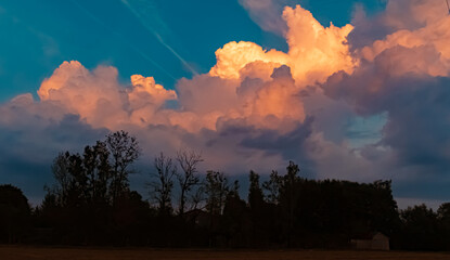Beautiful sunset with a dramatic sky near Tabertshausen, Bavaria, Germany