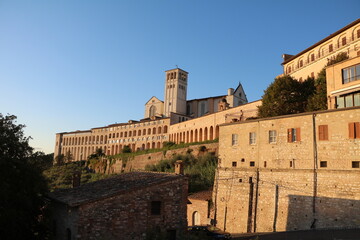 Fototapeta premium View to Basilica di San Francesco d'Assisi in Assisi at Sunset, Umbria Italy