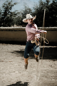A professional Mexican cowboy, practices with his lasso in Hacienda San Andres, Estado de Mexico, Mexico.