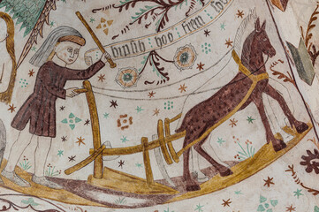 plowing with two horses, a medieval fresco in Elmelunde church, Denmark,