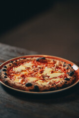 pizza on a wooden table