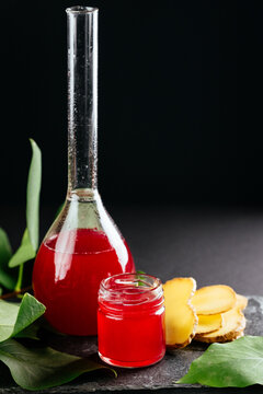 berry tinctures in shorts with fruit and berries on the backgrou