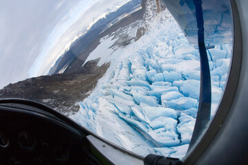 Point of view image of glacier seracs or crevasses as seen from small bush plane in backcountry wilderness near Haines, Alaska.