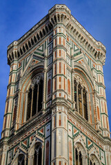 Fototapeta premium Marble facade of Giotto Campanile bell tower at the Duomo in Florence, Italy.