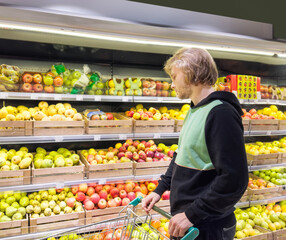 Man buying fruits at the market