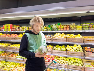 Man buying fruits at the market