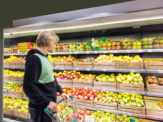 Man buying fruits at the market