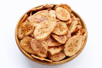Banana chips on white background.