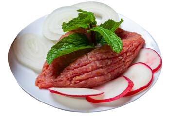 Raw kibbeh with mint leaf and radish, quibe cru